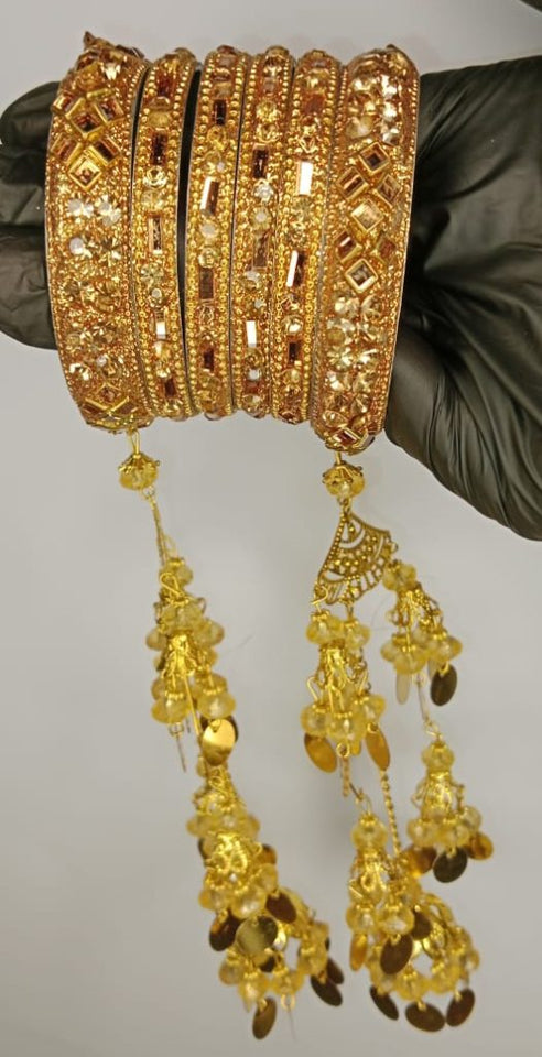 Luxurious Bridal Golden Bangles Set with Intricate Stonework and Traditional Hanging Kaleere for Weddings and Special Occasions